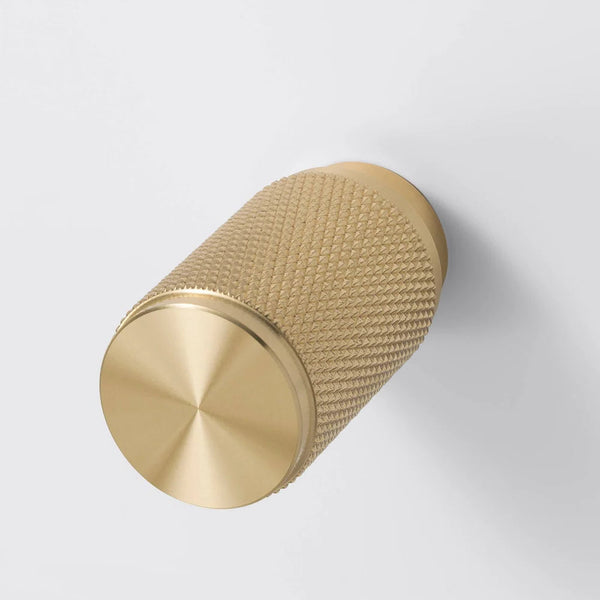 Four Gang 2 Way Dimmer Light Switch in White with Brass Cross Cut Knurled Knobs