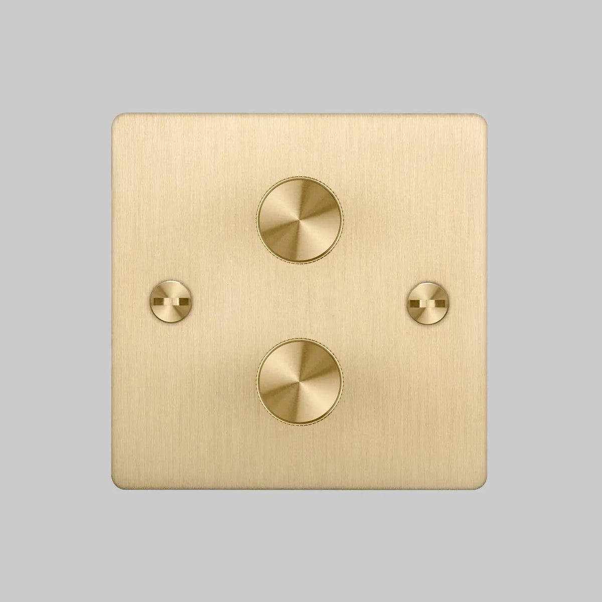 Brushed brass dimmer switch with two circular knobs and two flathead screws