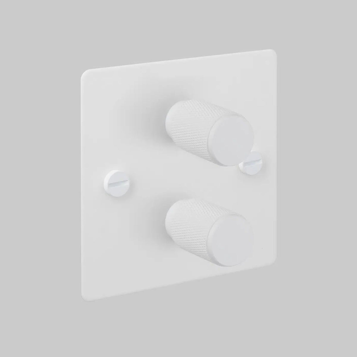 White dimmer switch with two textured rotary knobs and two visible screws