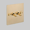 Two Gang 2 Way Light Switch in Brass with Cross Cut Knurled Toggles
