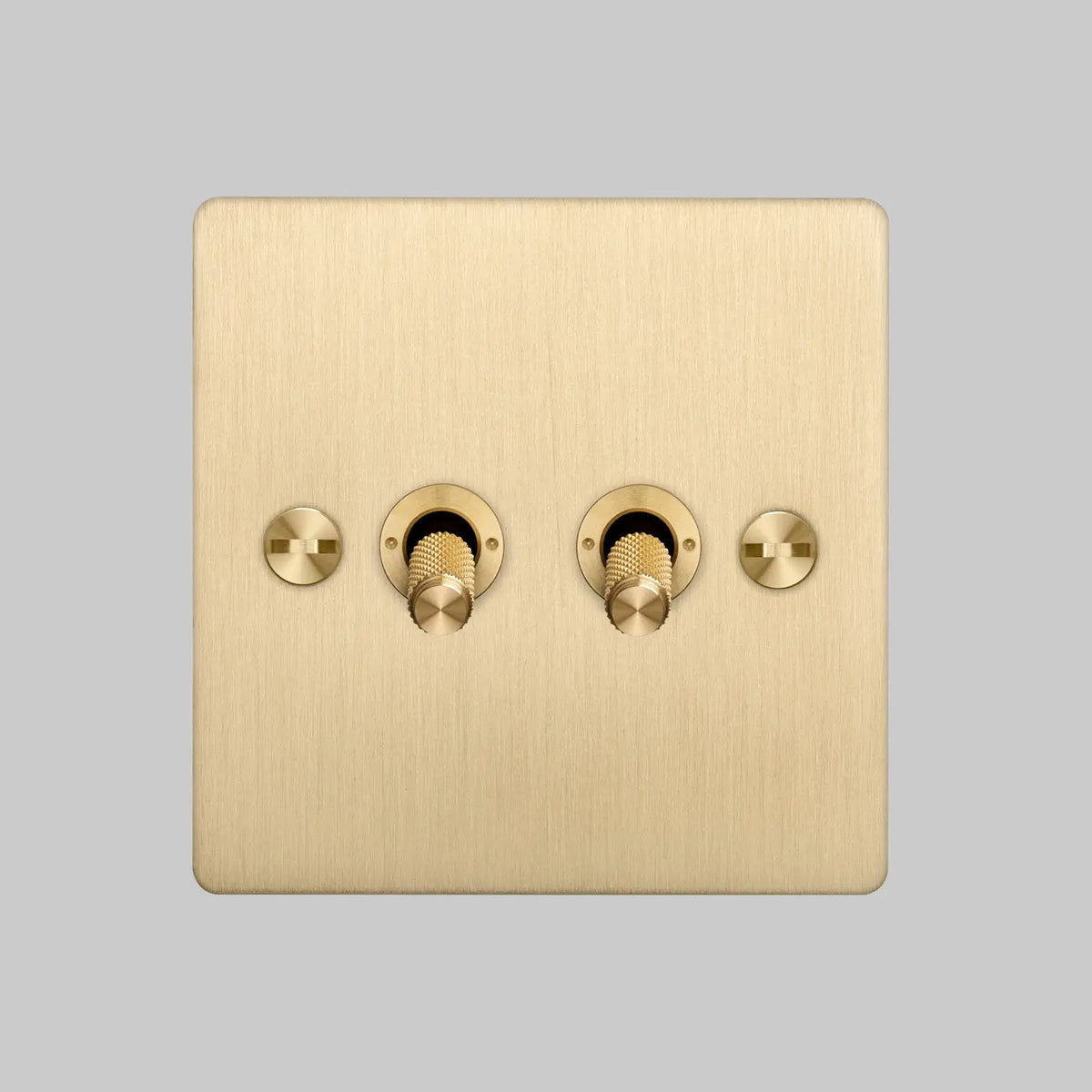 Two Gang 2 Way Light Switch in Brass with Cross Cut Knurled Toggles
