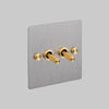 Two Gang 2 Way Light Switch in Steel with Brass Cross Cut Knurled Toggles