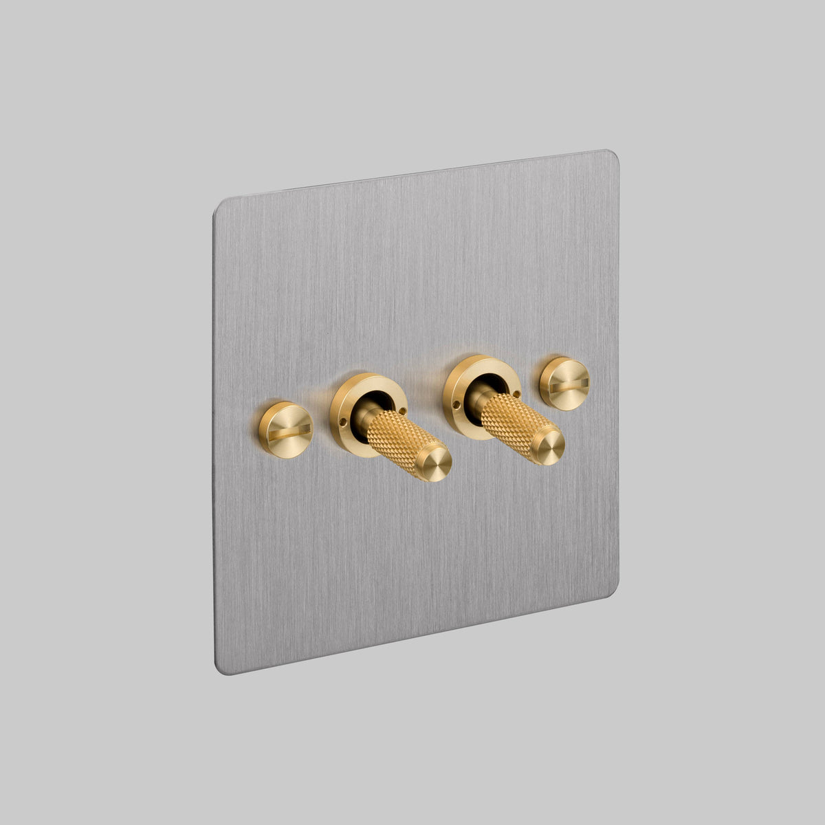 Two Gang 2 Way Light Switch in Steel with Brass Cross Cut Knurled Toggles