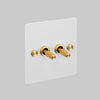 Two Gang 2 Way Light Switch in White with Brass Cross Cut Knurled Toggles