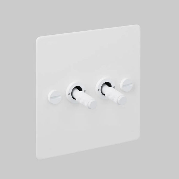 Two Gang 2 Way Light Switch in White with Cross Cut Knurled Toggles