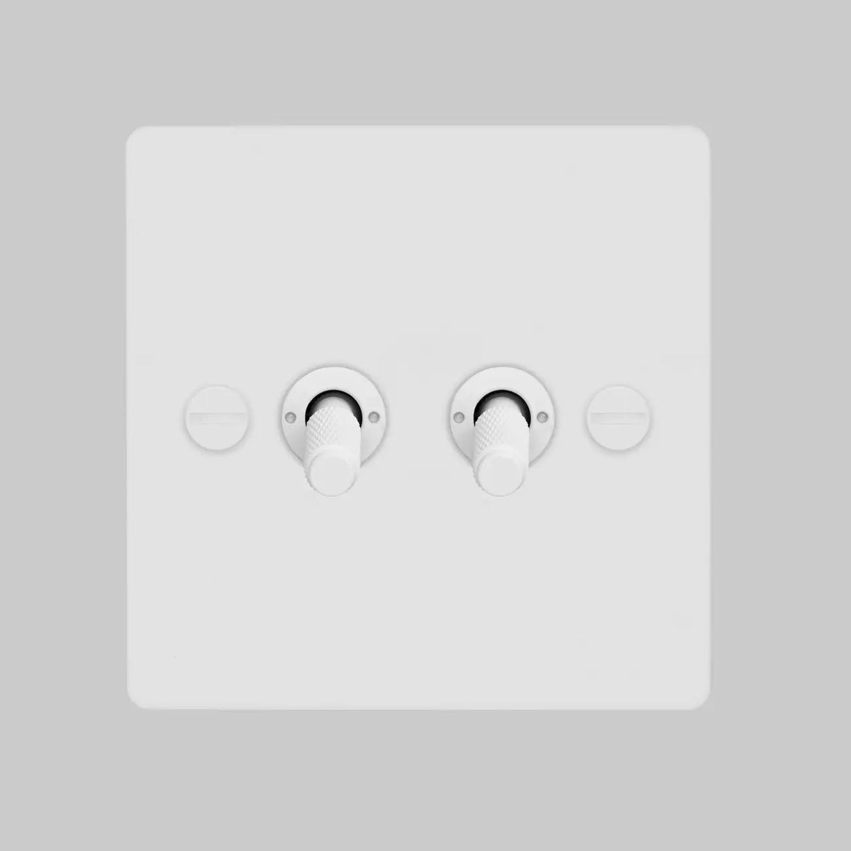 Two Gang 2 Way Light Switch in White with Cross Cut Knurled Toggles