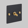 One Gang 3 Way Intermediate Light Switch in Black with Brass Cross Cut Knurled Toggle