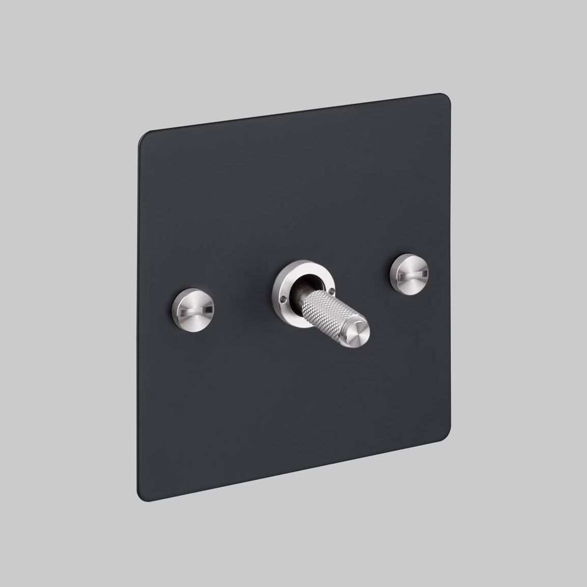 Buster and Punch one gang three way intermediate light switch in black with steel cross cut knurled toggle