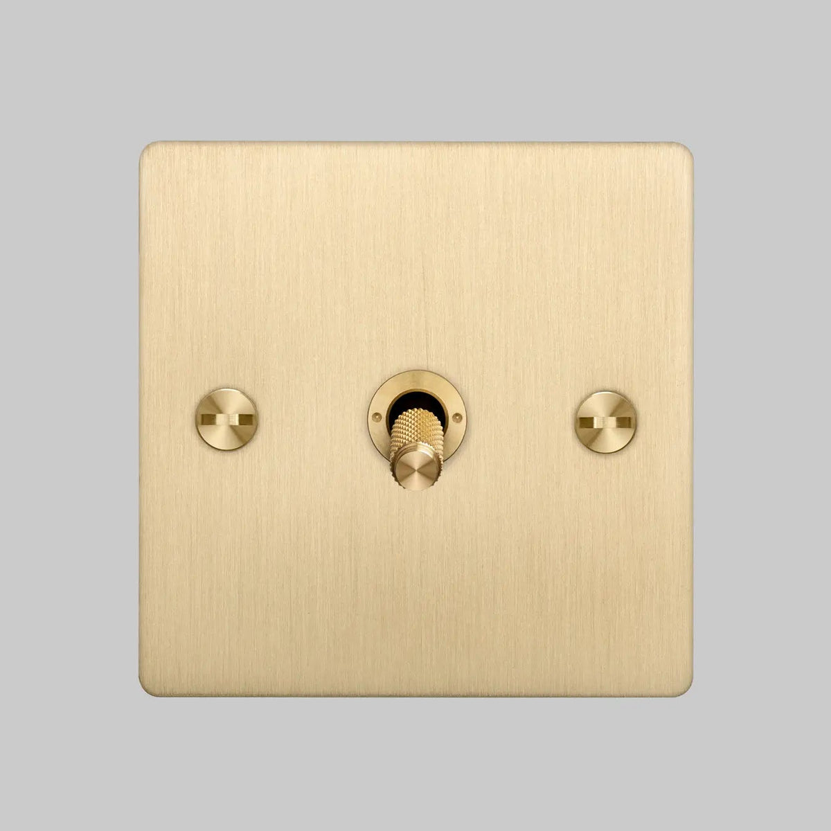One Gang 2 Way Light Switch in Brass with Cross Cut Knurled Toggle
