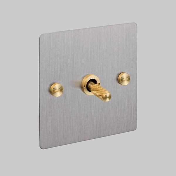 One Gang 3 Way Intermediate Light Switch in Steel with Brass Cross Cut Knurled Toggle