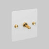 One Gang 3 Way Intermediate Light Switch in White with Brass Cross Cut Knurled Toggle