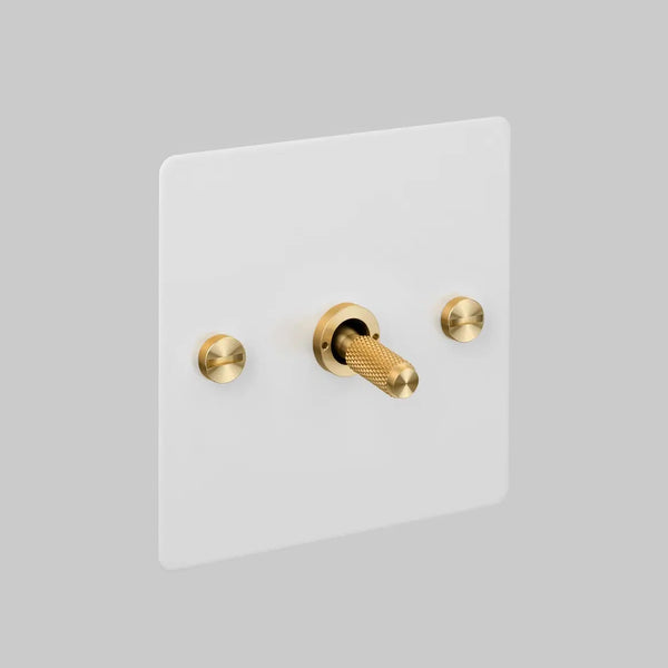 One Gang 3 Way Intermediate Light Switch in White with Brass Cross Cut Knurled Toggle
