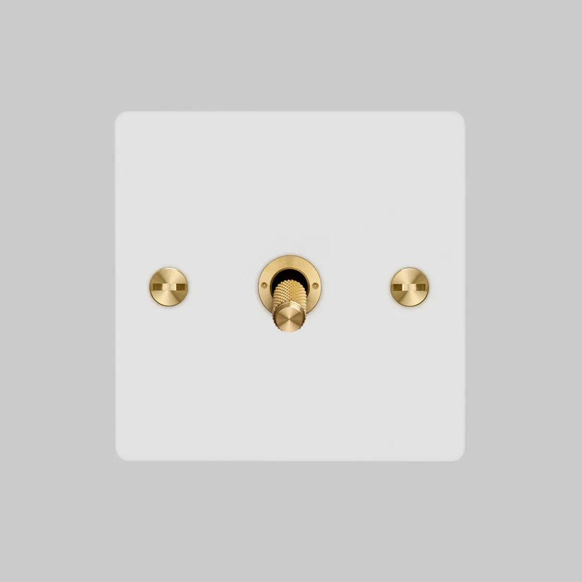 One Gang 2 Way Light Switch in White with Brass Cross Cut Knurled Toggle