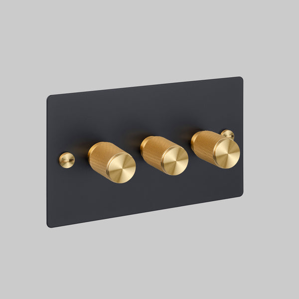Three Gang 2 Way Dimmer Light Switch in Black with Brass Cross Cut Knurled Knobs
