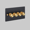 Four Gang 2 Way Dimmer Light Switch in Black with Brass Cross Cut Knurled Knobs