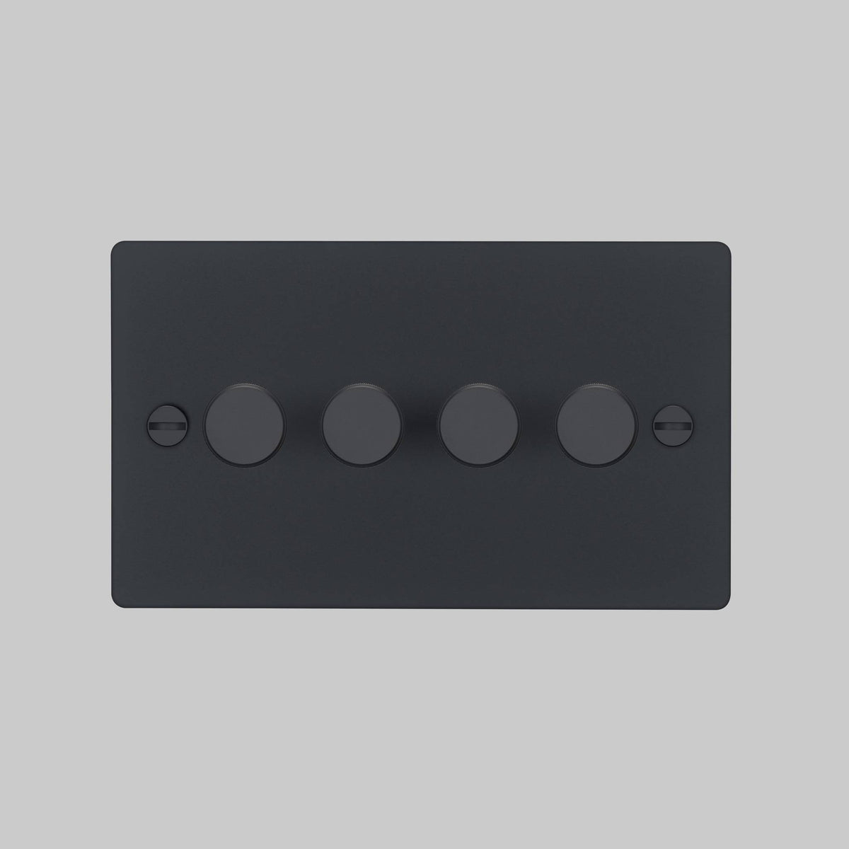 Four gang dimmer switch in a matte black finish with matching round knobs and visible flathead screws