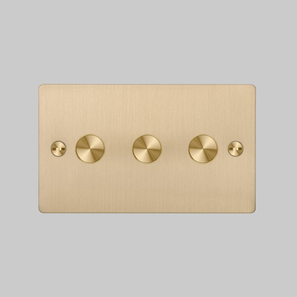 Brushed brass 3-gang dimmer switch with three round dimmer knobs and two flathead screws