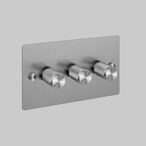 Brushed stainless steel triple dimmer switch with three knurled rotary knobs