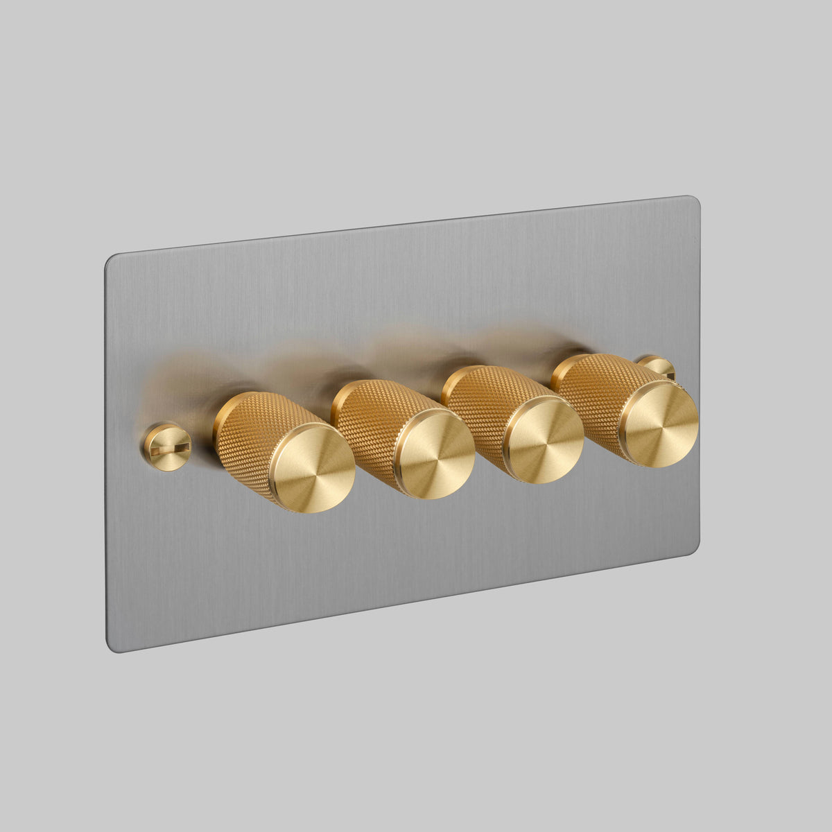 Four Gang 2 Way Dimmer Light Switch in Steel with Brass Cross Cut Knurled Knobs