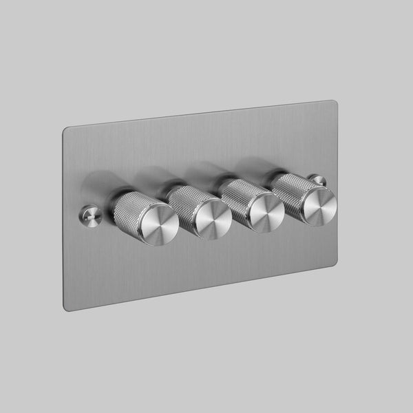 Brushed metal light dimmer switch with four knurled rotary knobs