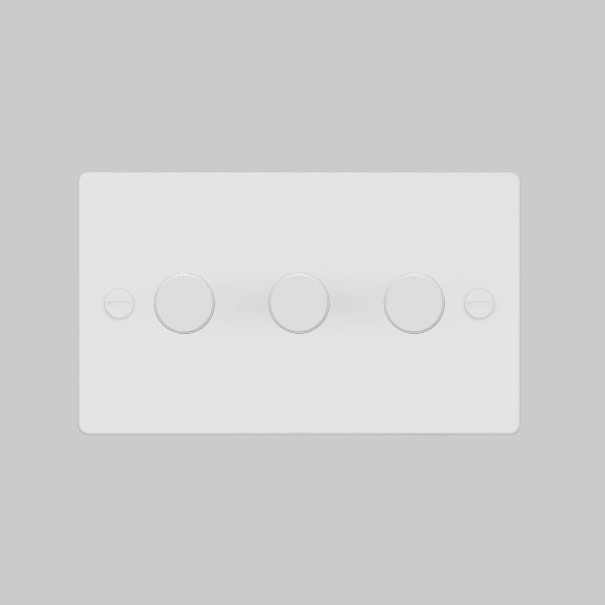 White rectangular light switch with three circular dimmer knobs and two screws