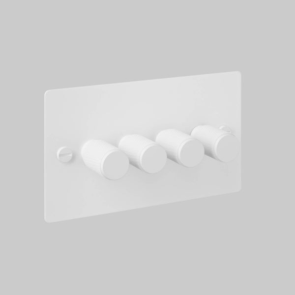 White 4-gang dimmer switch with textured rotary knobs and a flathead screw