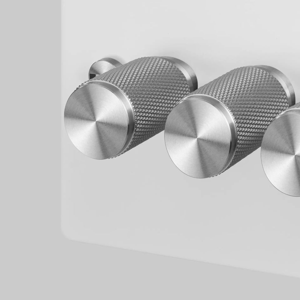 Four Gang 2 Way Dimmer Light Switch in White with Steel Cross Cut Knurled Knobs