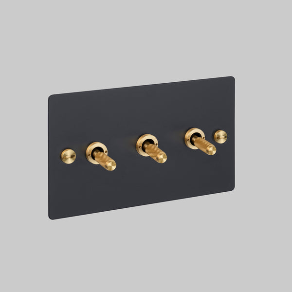 Three Gang 2 Way Light Switch in Black with Brass Cross Cut Knurled Toggles
