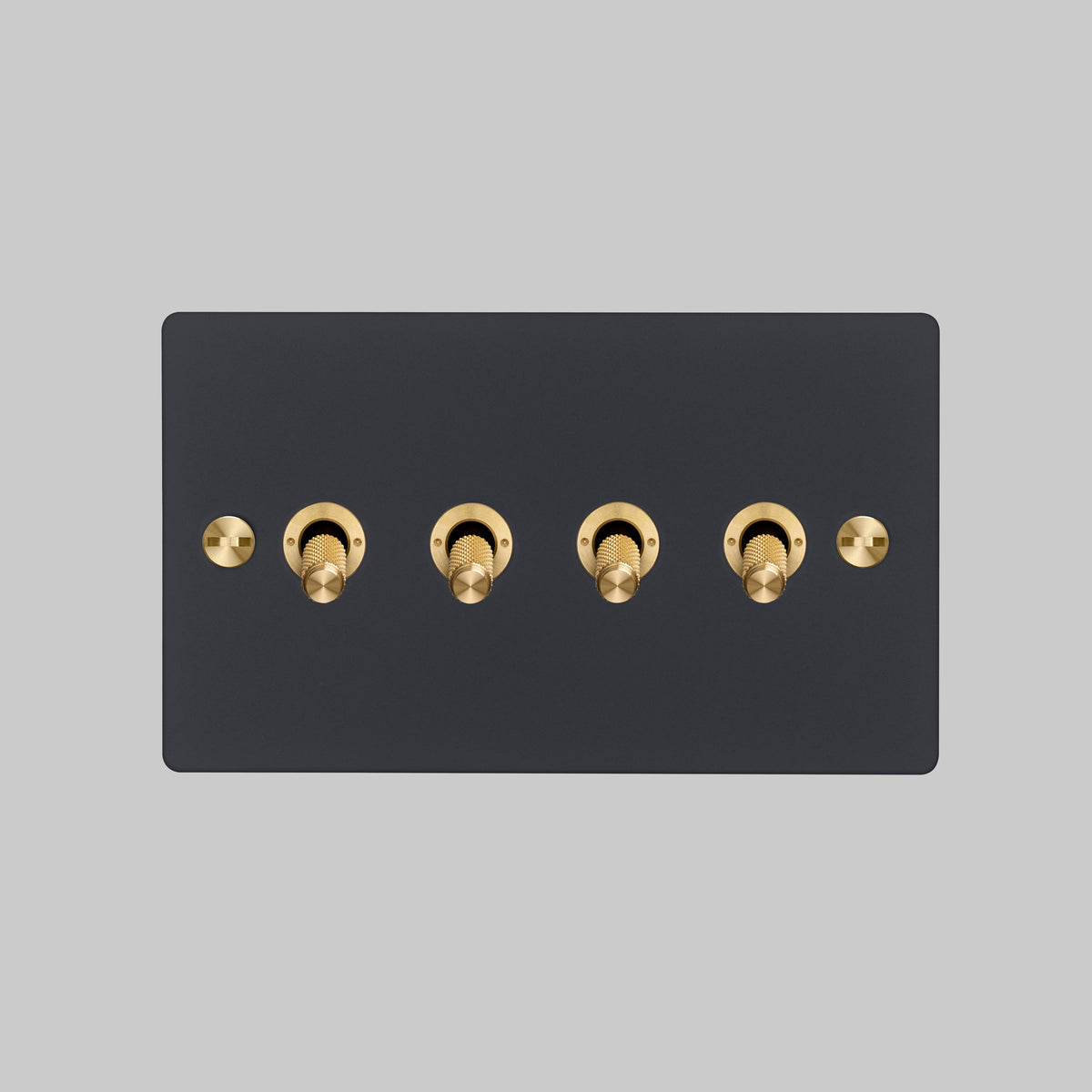 Four Gang 2 Way Light Switch in Black with Brass Cross Cut Knurled Toggles