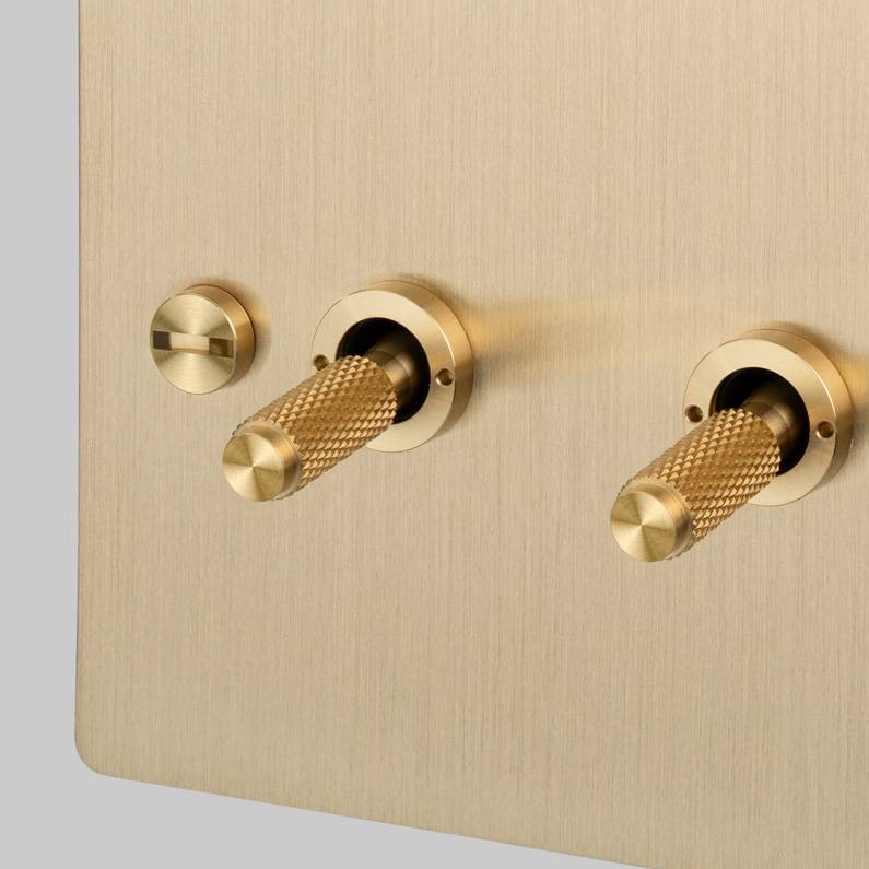 Three Gang 2 Way Light Switch in Brass with Cross Cut Knurled Toggles