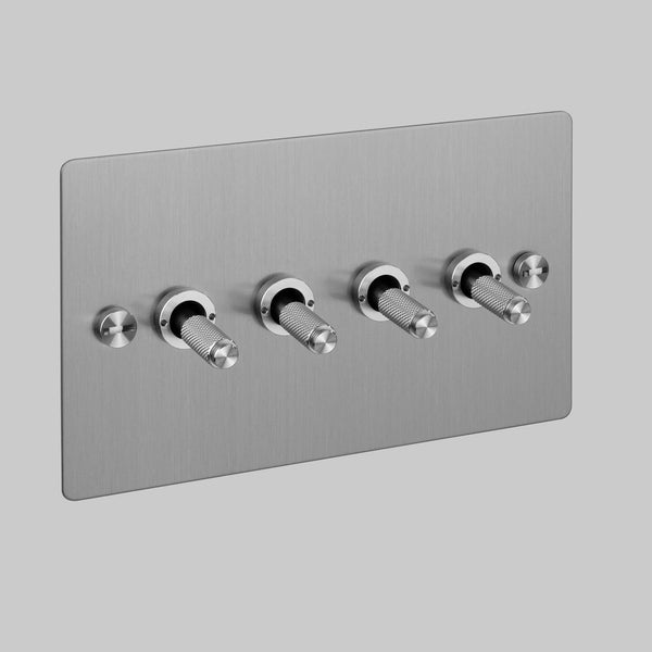 Four Gang 2 Way Light Switch in Steel with Cross Cut Knurled Toggles