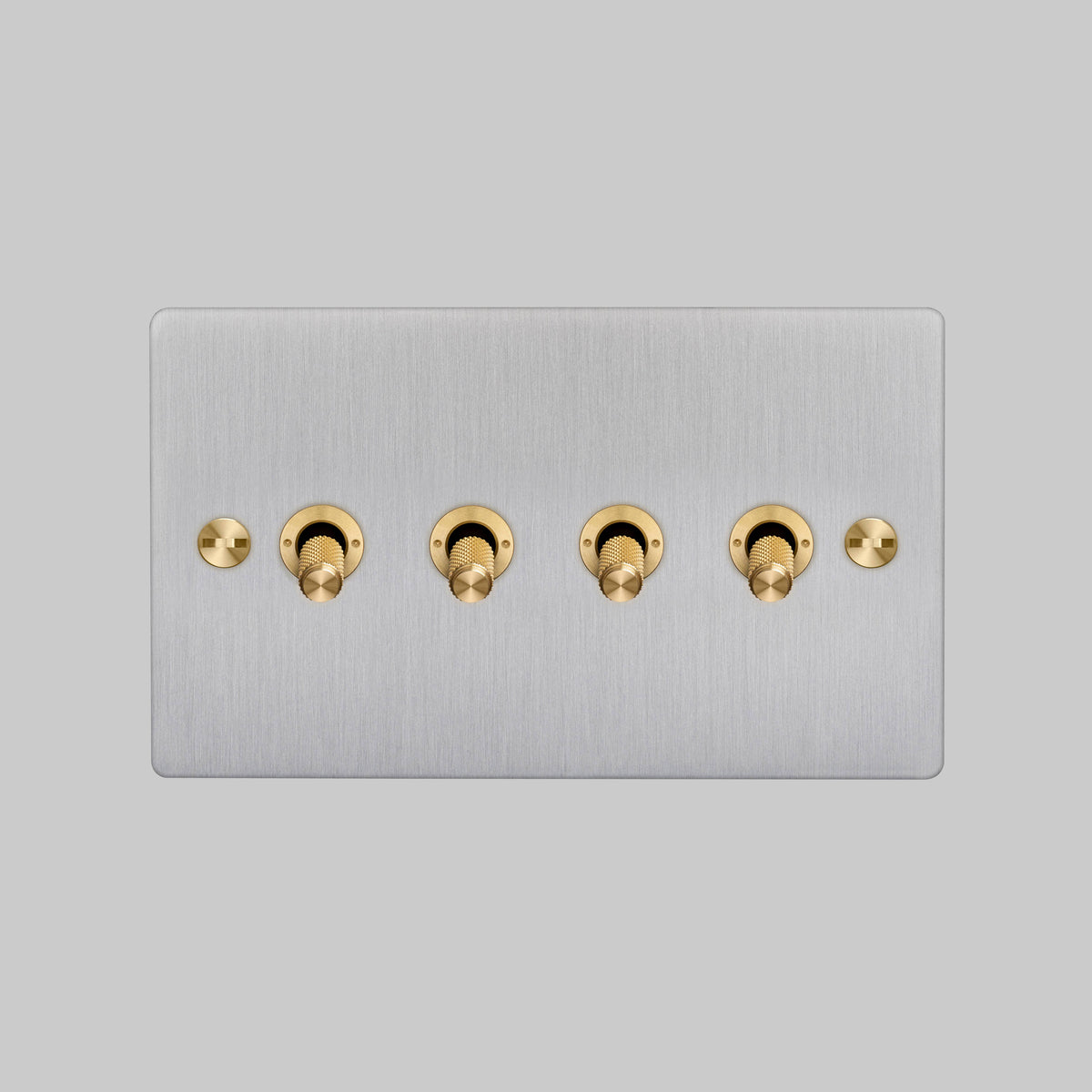 Four Gang 2 Way Light Switch in Steel with Brass Cross Cut Knurled Toggles
