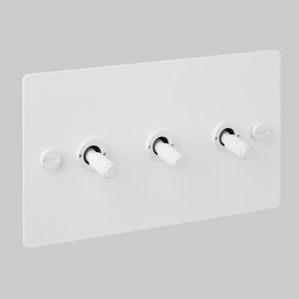 Three Gang 2 Way Light Switch in White with Cross Cut Knurled Toggles