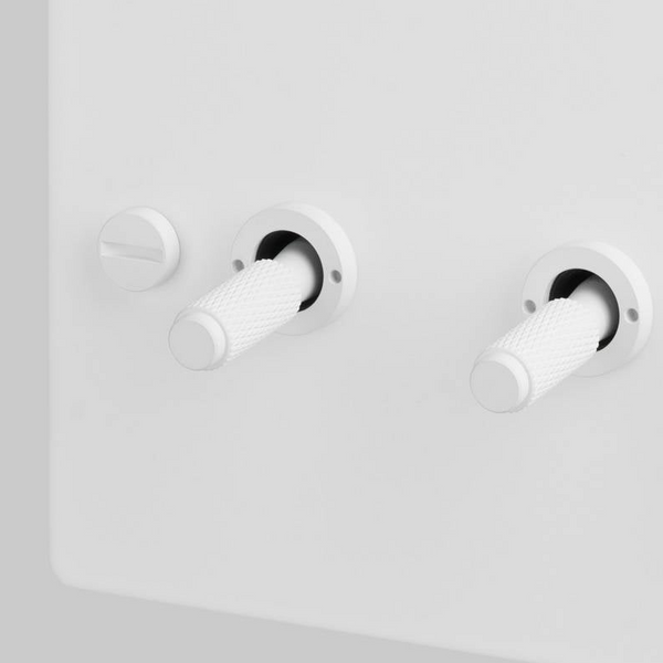 Three Gang 2 Way Light Switch in White with Cross Cut Knurled Toggles