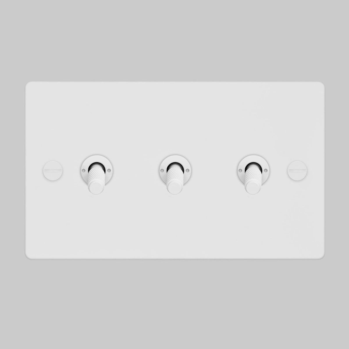 Three Gang 2 Way Light Switch in White with Cross Cut Knurled Toggles