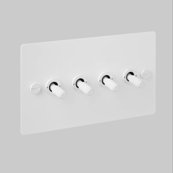 Four Gang 2 Way Light Switch in White with Cross Cut Knurled Toggles