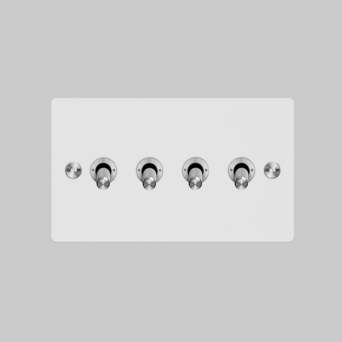 Four Gang 2 Way Light Switch in White with Steel Cross Cut Knurled Toggles