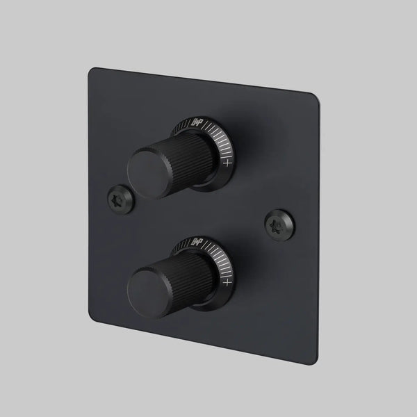 Black square wall plate with two black rotary dimmer switches and two black screws