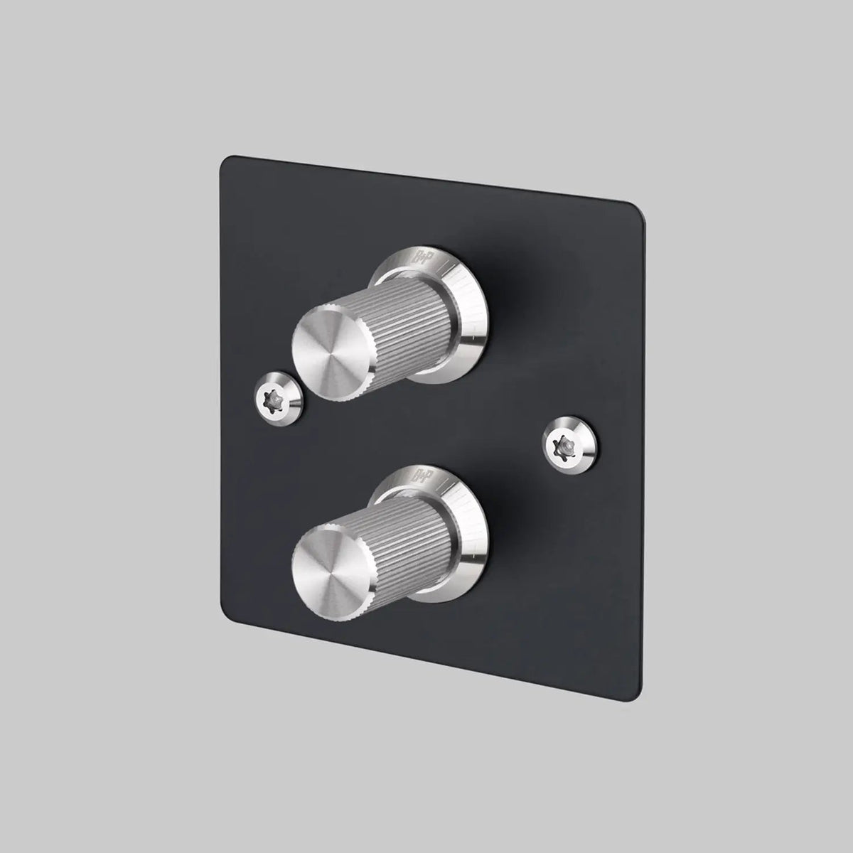 Buster and Punch two gang two way dimmer light switch in black with steel linear knurled knobs