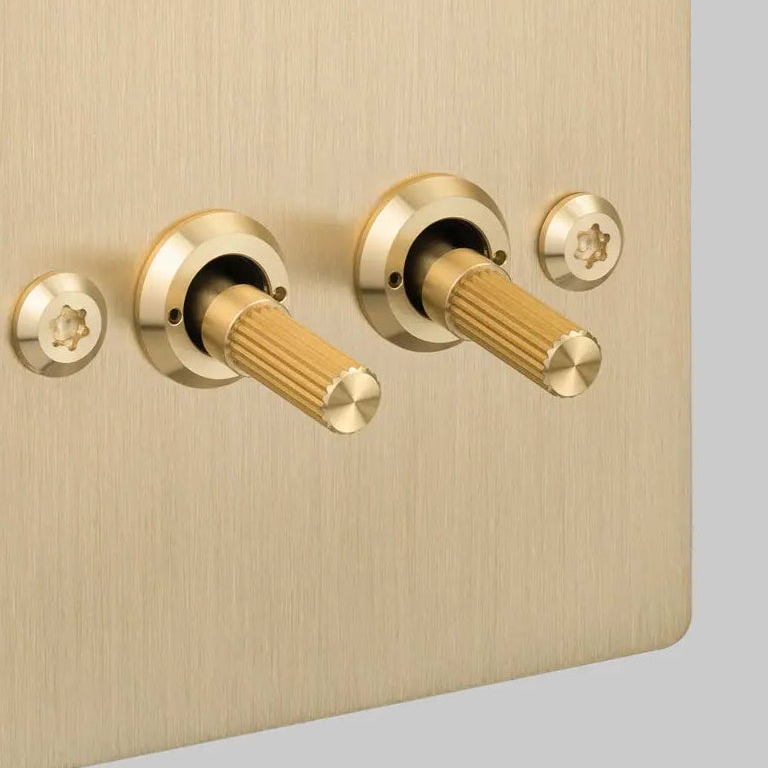 Two Gang 2 Way Light Switch in Brass with Linear Knurled Toggles