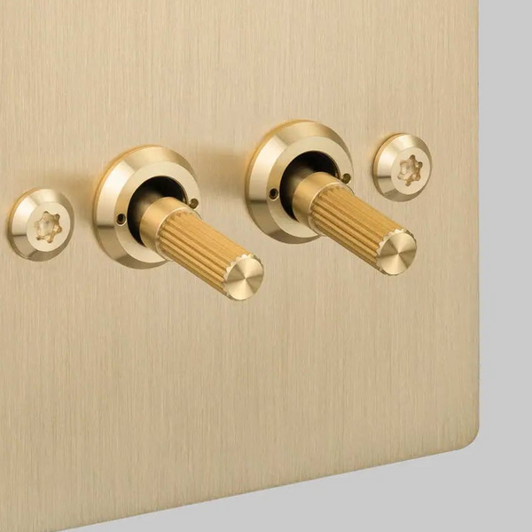 Two Gang 2 Way Light Switch in Brass with Linear Knurled Toggles