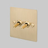 Two Gang 2 Way Light Switch in Brass with Linear Knurled Toggles