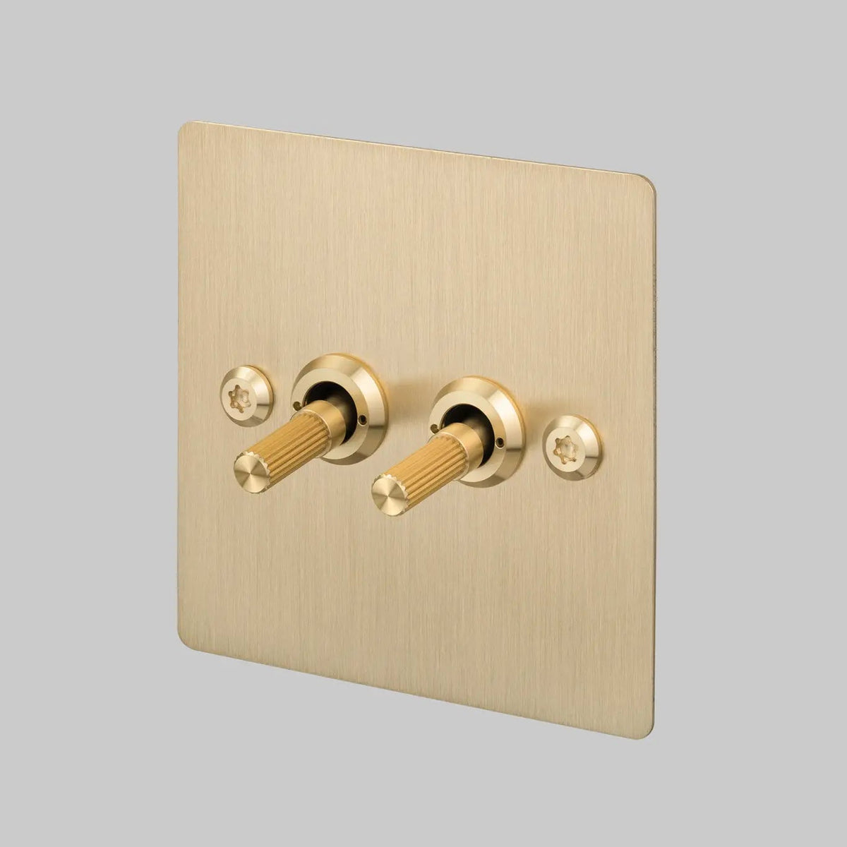 Two Gang 2 Way Light Switch in Brass with Linear Knurled Toggles