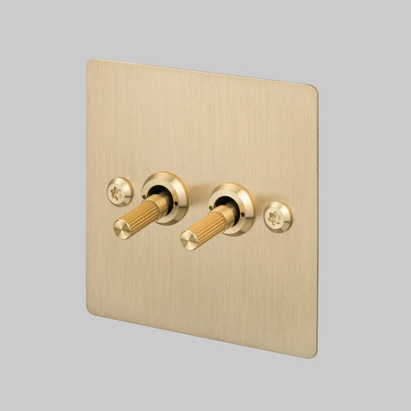 Two Gang 2 Way Light Switch in Brass with Linear Knurled Toggles