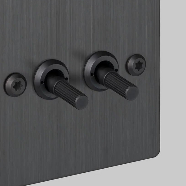 Four Gang 2 Way Light Switch in Smoked Bronze with Linear Knurled Toggles