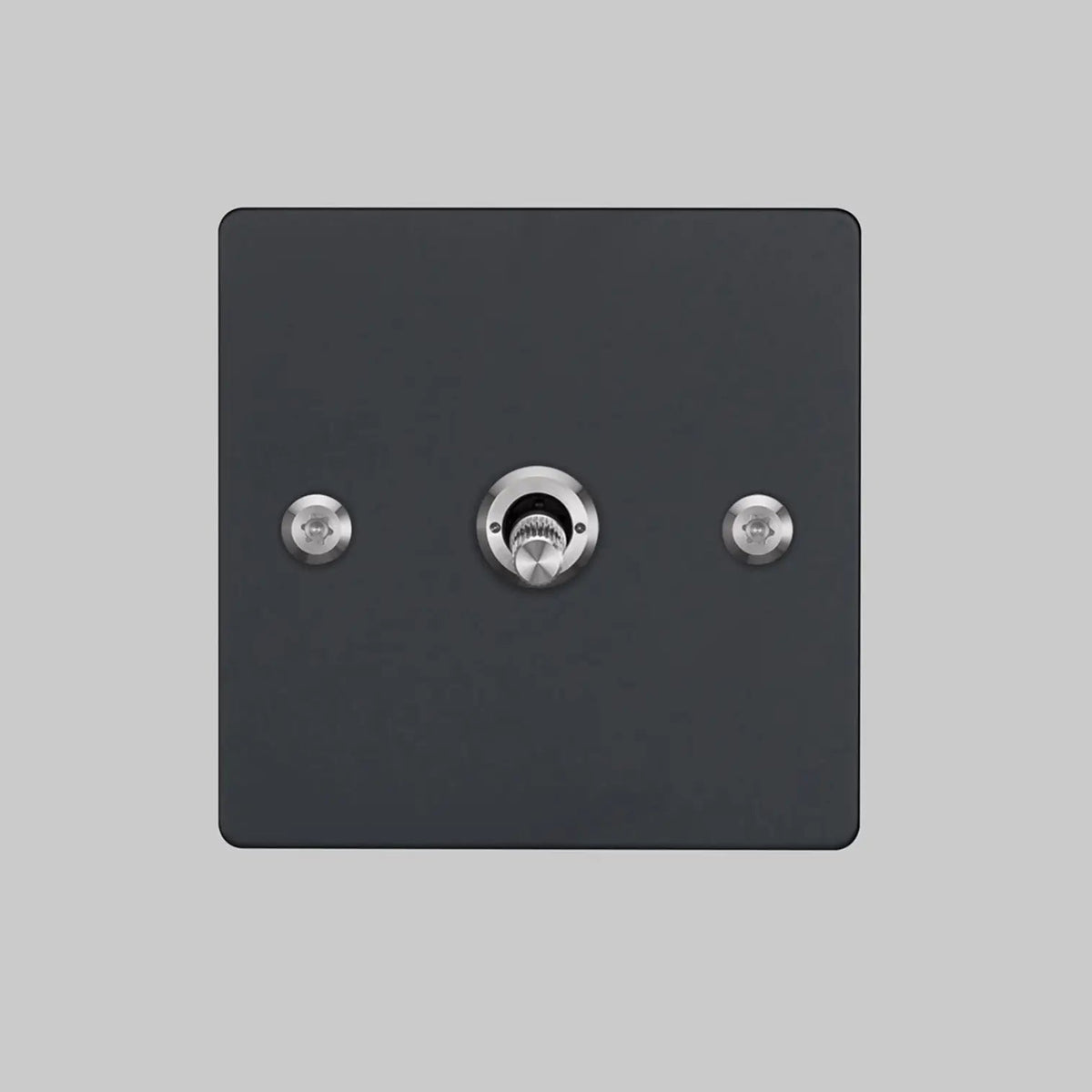 Buster and Punch one gang two way light switch in black with steel linear knurled toggle