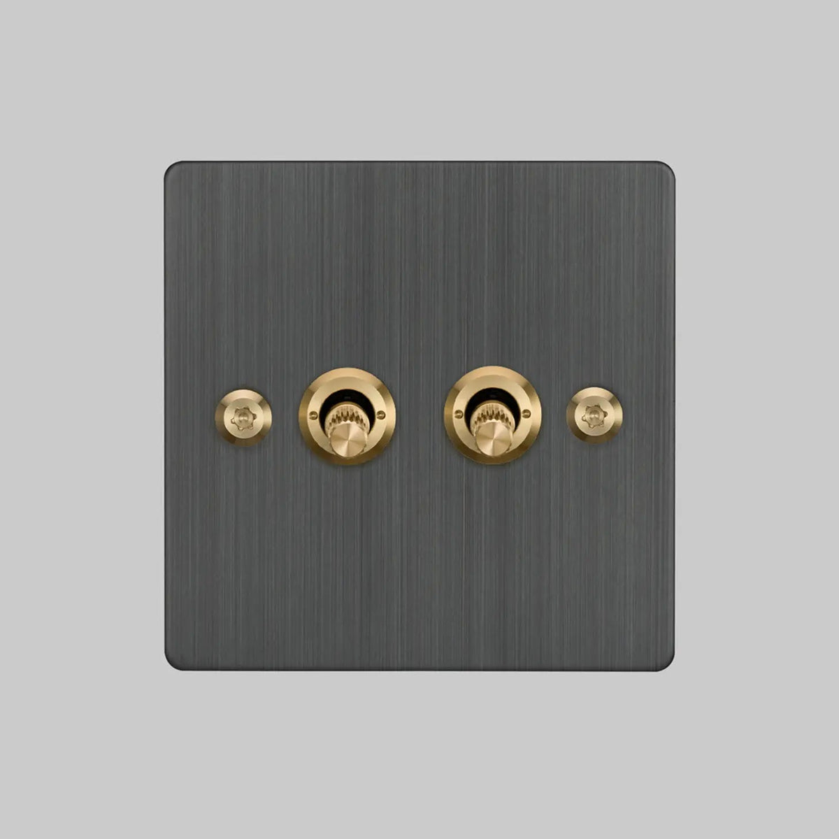 Buster + Punch two gang two way light switch in smoked bronze with brass linear knurled toggles