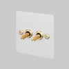 Two Gang 2 Way Light Switch in White with Brass Linear Knurled Toggles