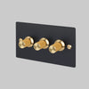 Three Gang 2 Way Dimmer Light Switch in Black with Brass Linear Knurled Knobs