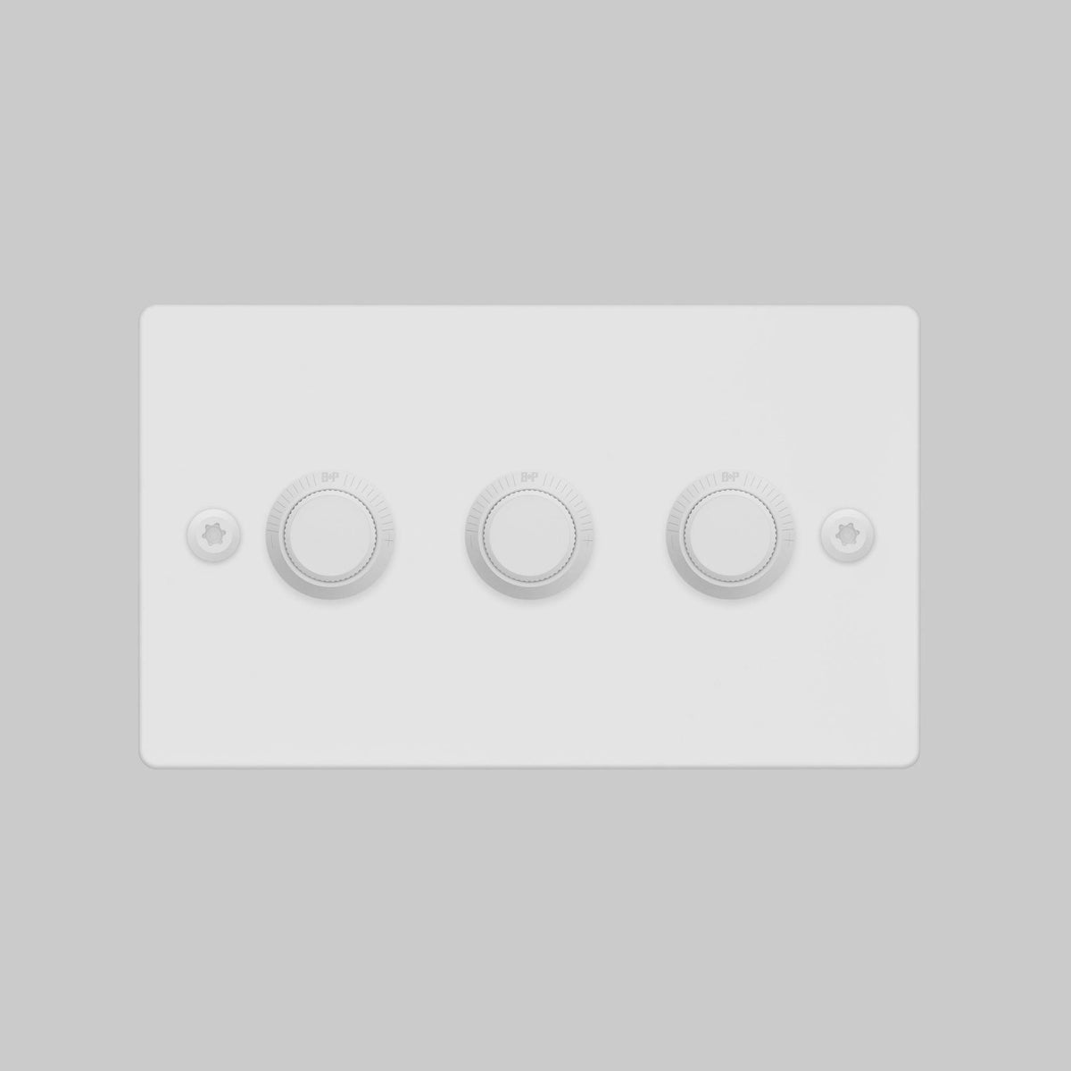 White triple dimmer switch with three circular knobs and two visible screws